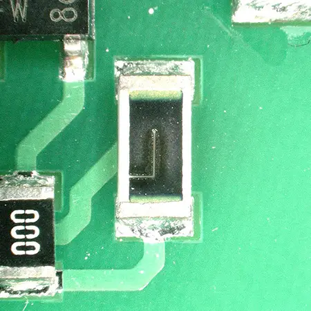 Electronic resistor on circuit board, L-cut laser trimmed with ACI laser trimmer