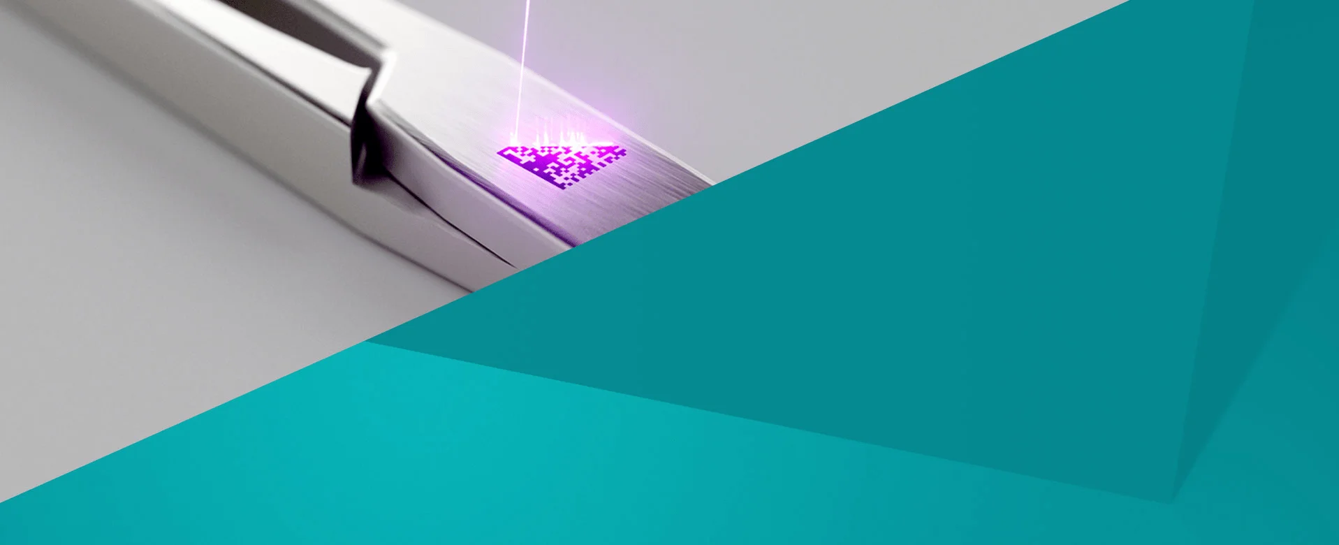 Laser creates black marking of a DMC on stainless steel surgical scissors